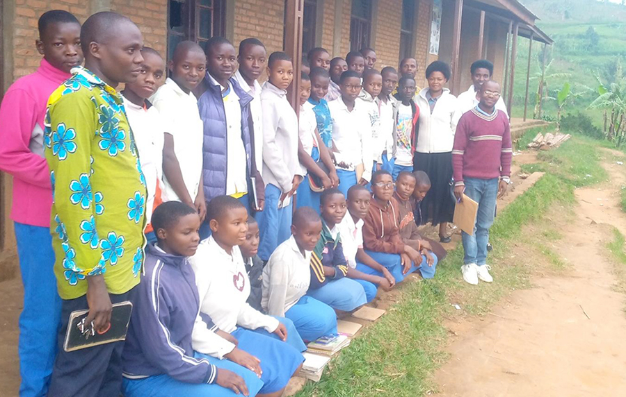 Group photo of members of school environmental club following a sensitisation session on natural resource conservation and biodiversity management.